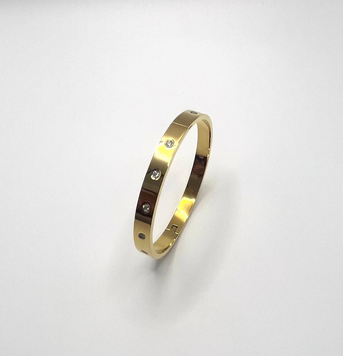 Stone Set Gold Hinged Bangle