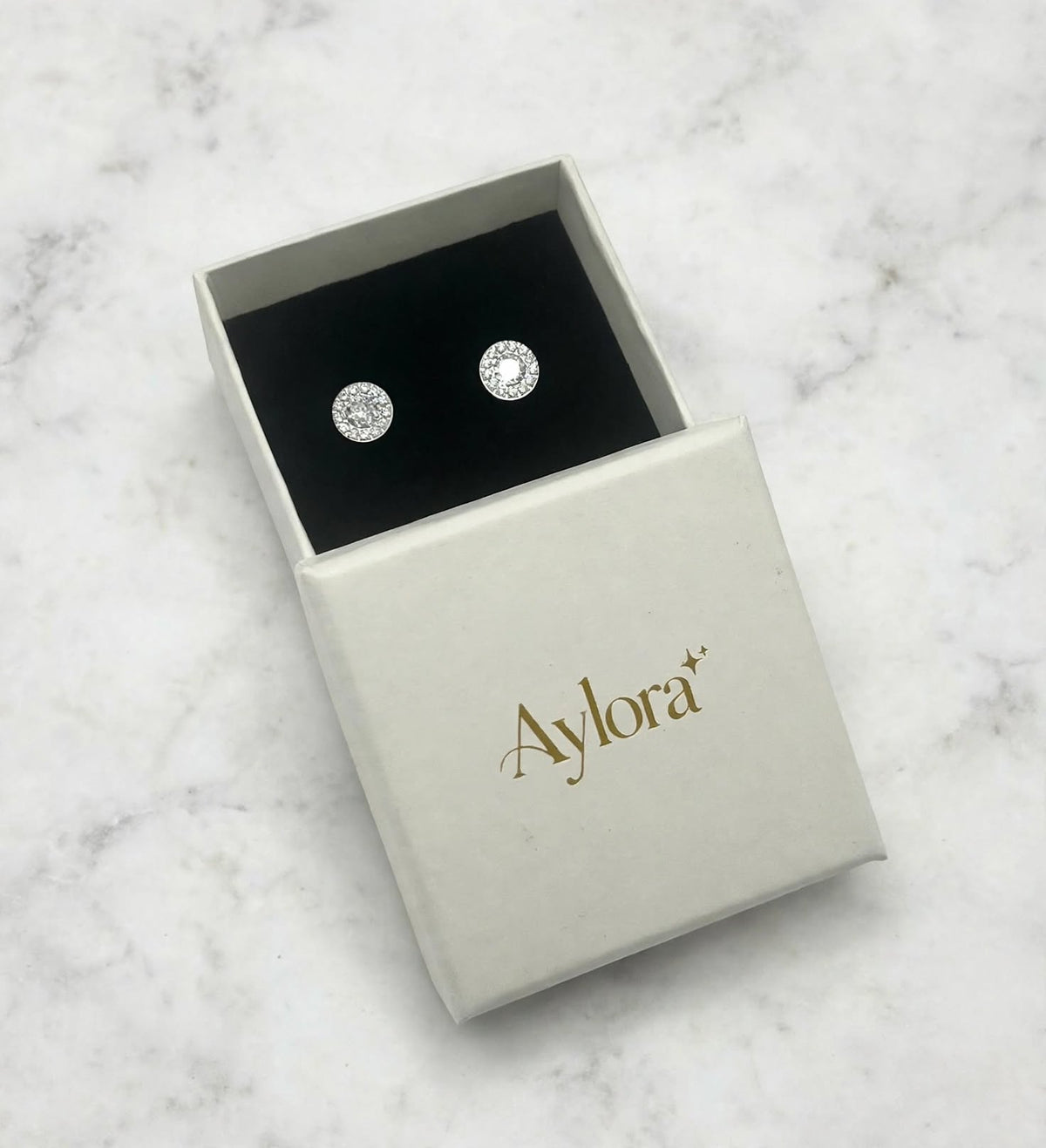 Pavo Halo Silver Studs Earrings